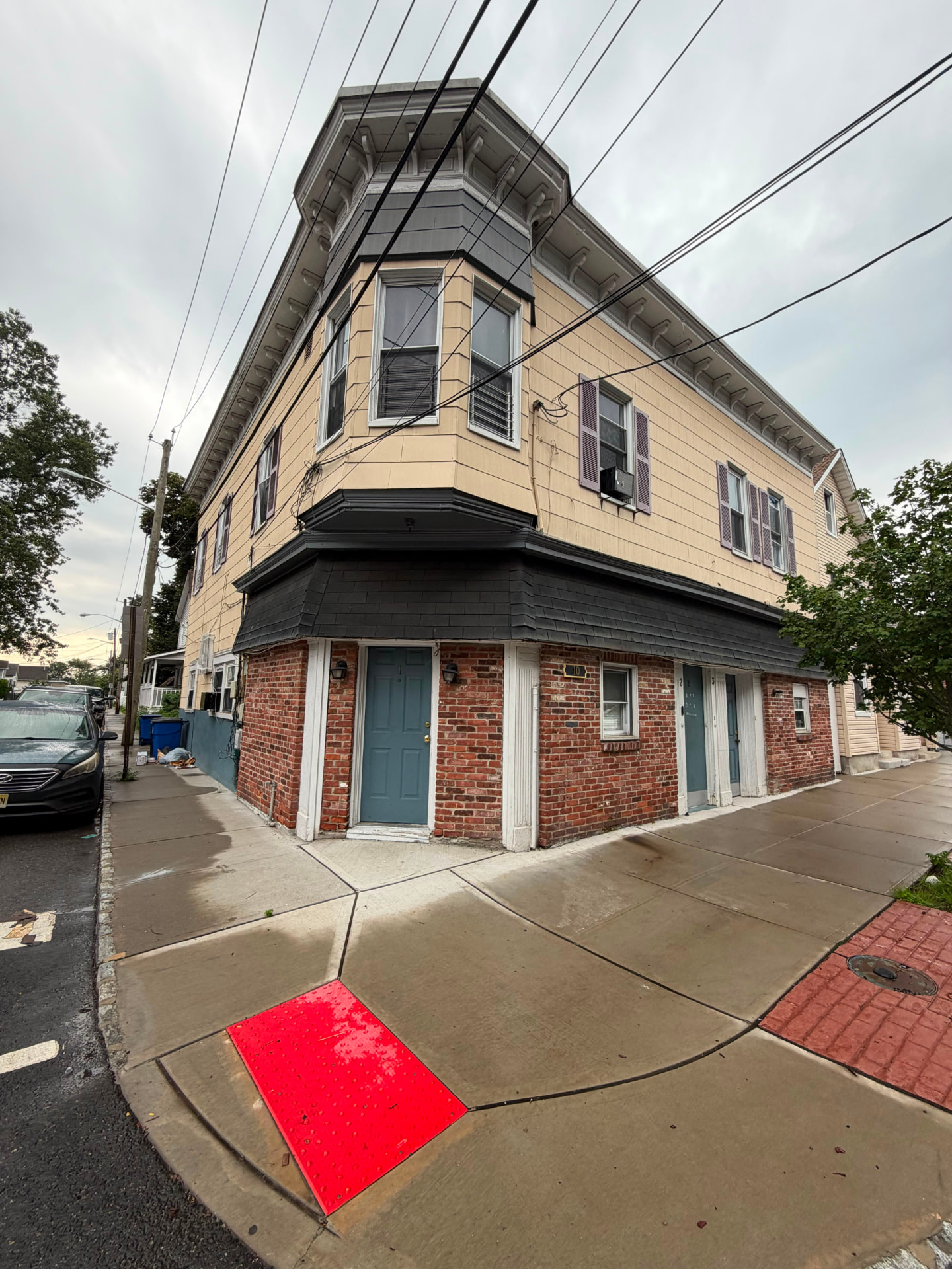 Street perspective of a managed multi-family building in Jersey City