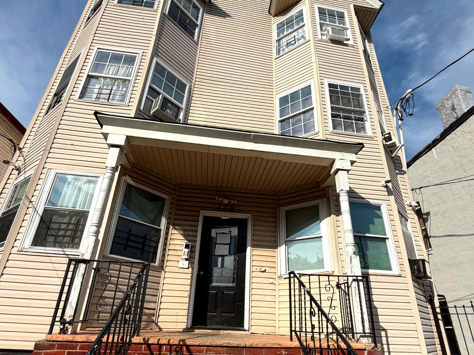 Entry porch and steps at 132 Wilkinson Ave, Jersey City