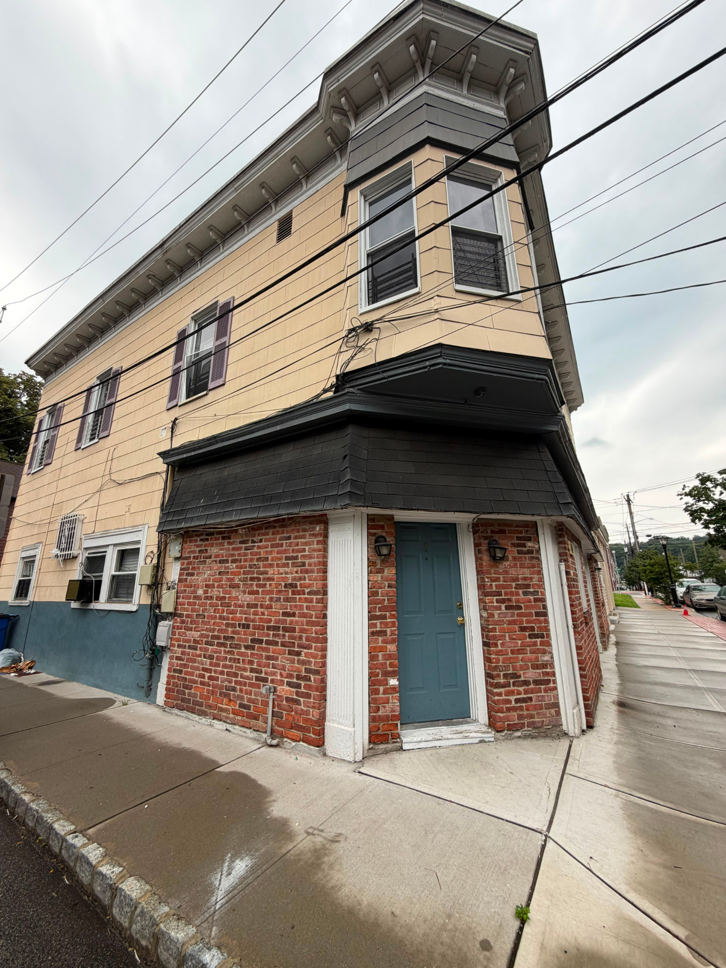 Corner view of a managed multi-family building in Jersey City