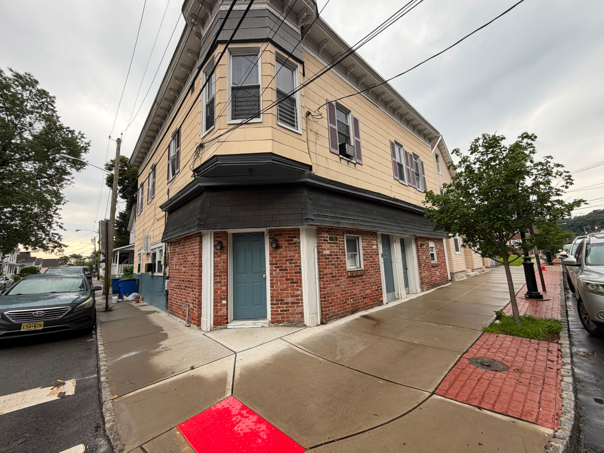 Side street view of a managed multi-family building in Jersey City